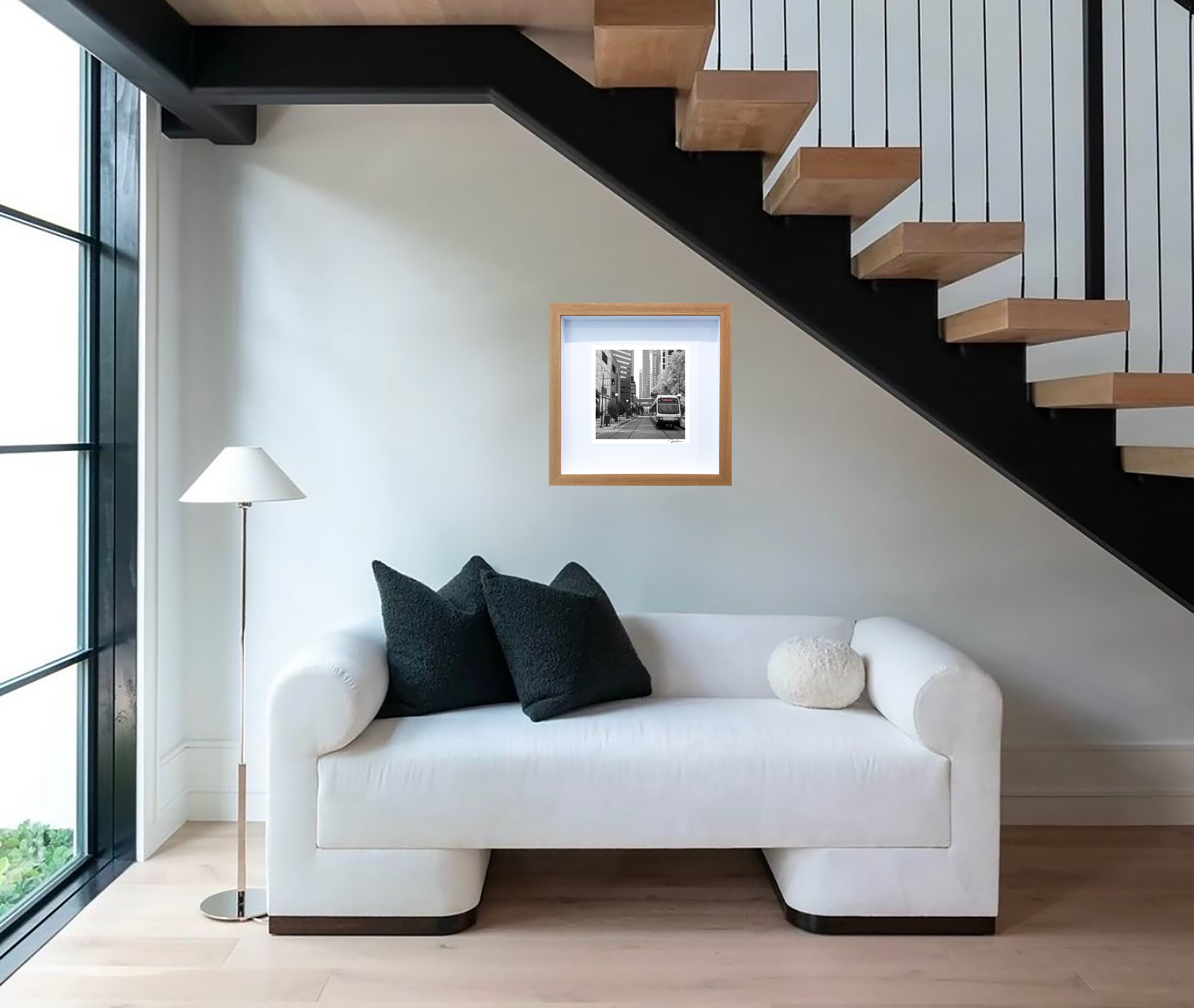 Red Line photograph framed and staged under stairs